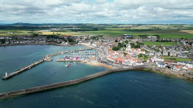 Stunning Aerial Drone Footage of the Aberdour Coastline in Scotland, Scenic Seaside Landscape with Rocky Cliffs, Blue Ocean Waves and Picturesque Coastal Views, Travel and Nature Background Video