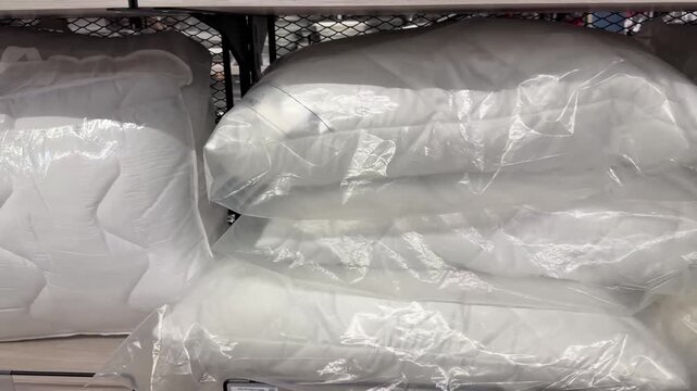 new white pillows for sale on a store shelf