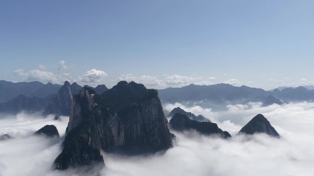 aerial video of the Huashan mountain rising above the sea of clouds, Shaanxi province, China