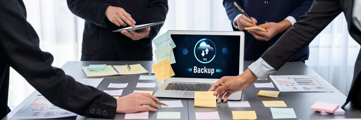 Analyst team use sticky note for creative and analytic brainstorm for business idea with BI data dashboard on laptop screen. Analysis financial data visualization tech for marketing strategy. Prodigy