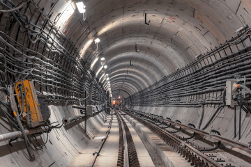 Railway underground metro tunnel which install running and conductor rail
