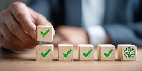 A hand places a wooden block with a checkmark, signifying completion of tasks