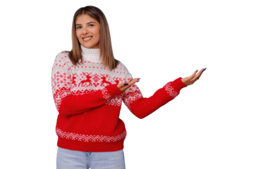 Woman presenting and smiling in red fair isle christmas sweater, offering holiday season greeting, transparent background