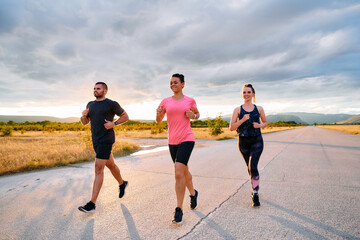 Athlete Leading Group Run at Sunset Amidst Stunning Nature