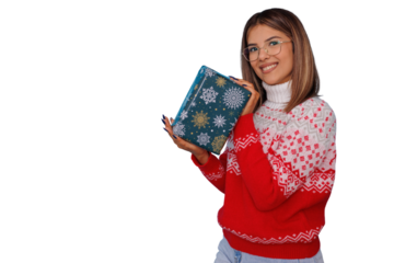 Happy woman in festive christmas sweater holding gift box with snowflakes, smiling for holiday celebration