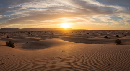Desert landscape at sunset with dunes and dramatic sky background