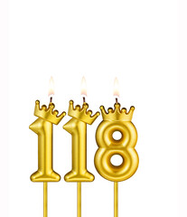 Golden number 118 birthday candle on white background