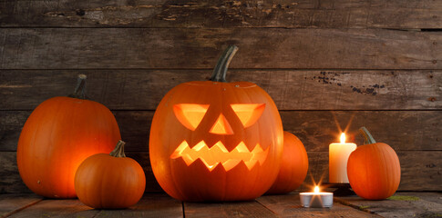 halloween pumpkins on wooden background