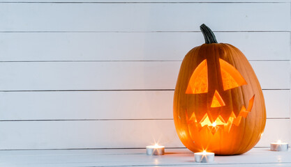 halloween pumpkins on wooden background
