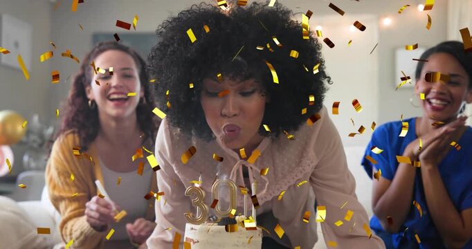 3 women on sofa celebrating 30th birthday blowing candles releasing animated confetti for marketing