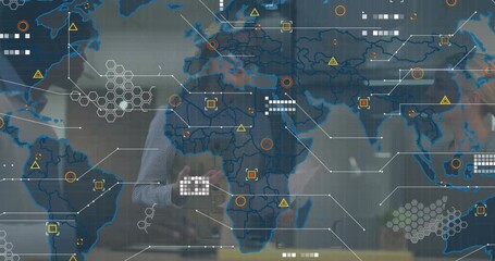 Manager tapping smartphone and launching data icons on world map showing stats for business meeting - Powered by Adobe