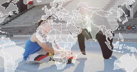 Athlete adjusting running blade on sports track after coach gesturing stopwatch with fading map - Powered by Adobe