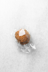 Overhead view of fried scotch eggs on white countertop