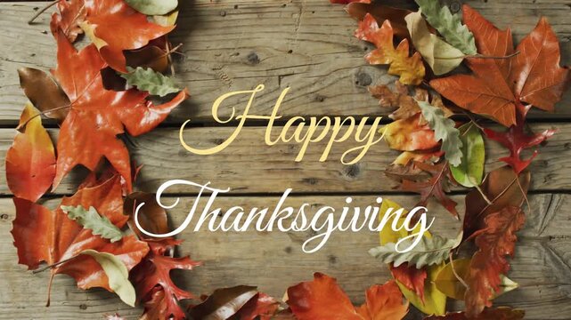 Launching greeting screen showing wood plank with autumn leaves framing Happy Thanksgiving text