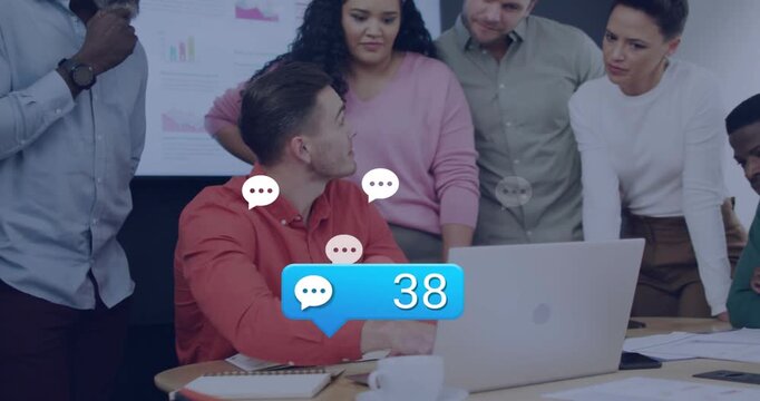 Seated man in red typing on laptop while chat bubbles and counter rising, business team monitoring