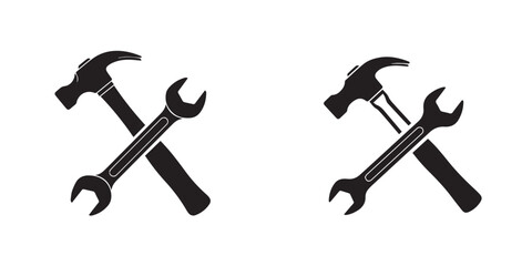 Crossed Hammer and Wrench Tools Icon Silhouette on White Background