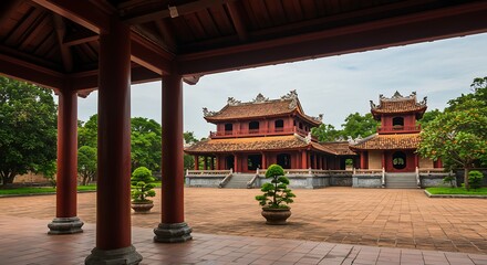 Ancient red building with ornate architecture under an overcast sky