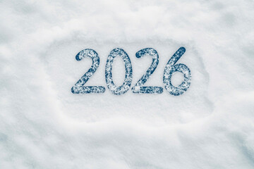 2026 number written in fresh white snow, winter background, cold season, frosty texture, new year concept, clean and minimal design