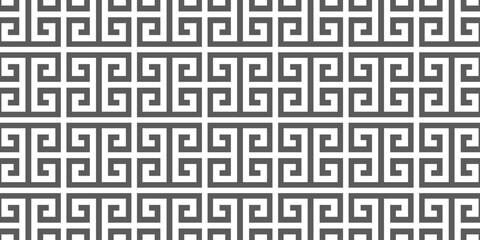 Seamless geometric Greek key pattern in black and white, perfect for backgrounds, textiles, and decorative designs.