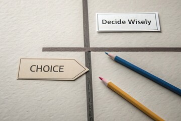 Visual representation of decision-making with labeled arrows and colored pencils on textured paper