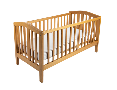Wooden baby crib, light wood finish, with white mattress, on black background