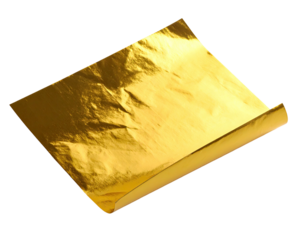 Shiny, golden square of paper or foil partially rolled. Lit from above