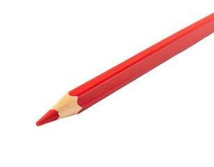 Close-up of a sharpened, red colored pencil against a stark black background