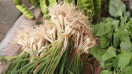 vegetable chives in stalls of Indonesian traditional market sellers
