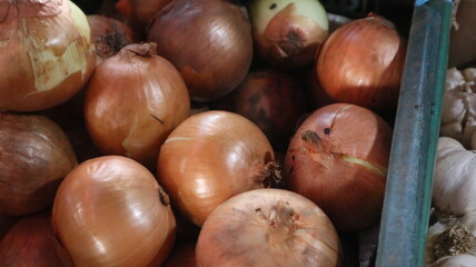 some onions in the stalls of Indonesian traditional market sellers