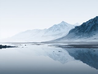 Serene Arctic Landscape with Snow-Capped Mountains and Reflective Water Body