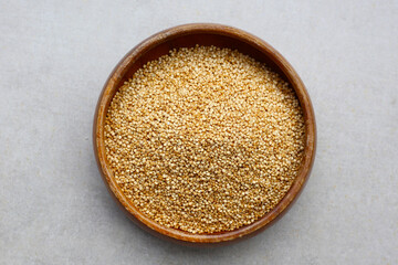 Raw quinoa seeds in a bowl.
