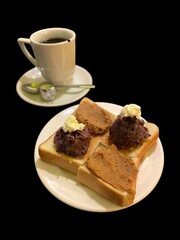 breakfast with a cup of coffee and bread