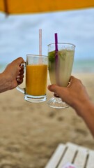 Tropical Drinks Toast by the Beach
