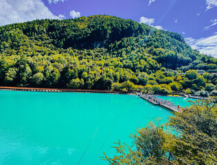 TIBET  Basong Tso, Tibet, lake, alpine, mountains, reflection
A serene alpine lake reflecting mountains and clouds