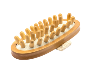 Wooden massage tool with rounded pegs on a textured surface and a loop