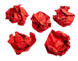 Five crumpled red paper balls against a black background