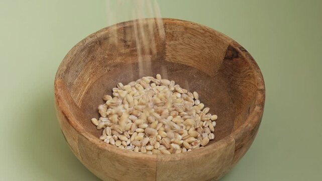 Raw pearl barley porridge Gluten free cereals. Health gut benefits. Concept of alternative whole spelt grain ingredient. Vegetarian diet recipes. Plant-based lifestyle. Copy space Protein rich eating 