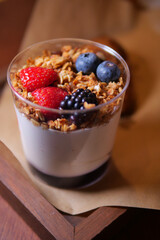 Delicious yogurt parfait with fresh berries and granola