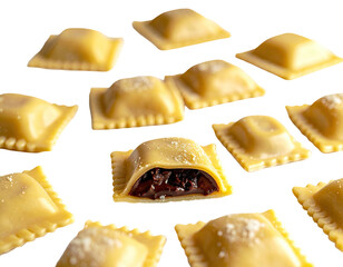 Close-up of several fresh, filled ravioli, on a black background, some in focus
