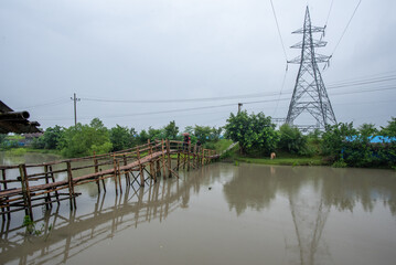 bamboo bridge on a small river