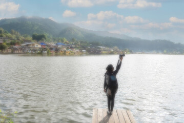 Lifestyle traveler women happy feeling good relax and freedom facing . Travel Concept
