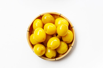Pickled jujube fruits with a sweet and tangy flavor.