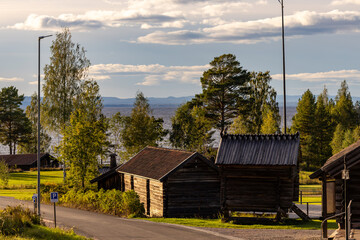 T&auml;llberg, Sweden A landscape with traditional wooden houses typical of the Dalarna region.