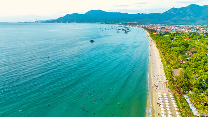 Aerial view of tropical Doc Let beach with turquoise waters and white sand in Vietnam