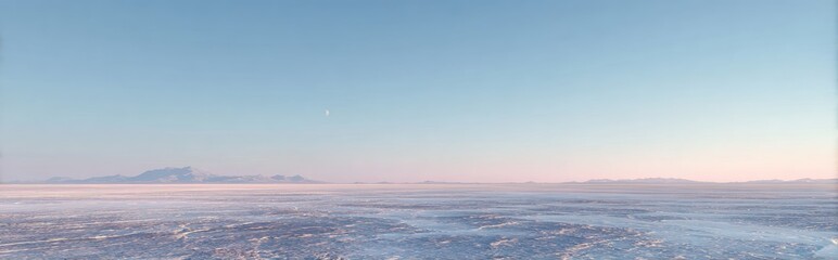 Pale, ethereal landscape view, soft focus.  Vast, hazy plain stretches beneath a pale blue sky, touched with dawn's soft pink hues.  A distant, hazy mountain range