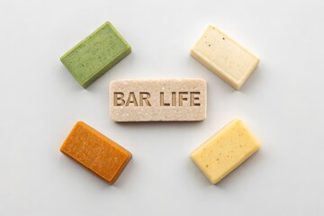 Arrangement of shampoo and soap bars on a white surface