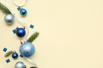 Composition with Christmas decor and confetti on beige background