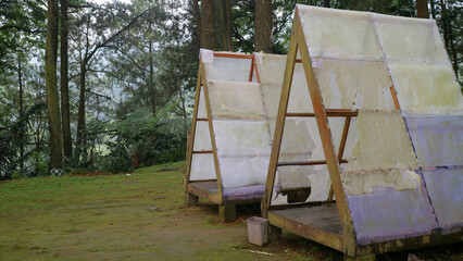 Rustic A Frame Tents in Forest Setting