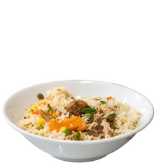 A vibrant bowl displays a delicious rice dish with colorful vegetables and tender meat, served in a white ceramic bowl against a black backdrop, showcasing a hearty meal.