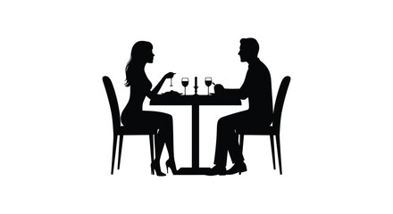 Couple enjoying a romantic dinner together at a table silhouette